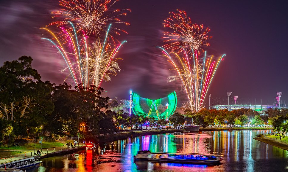 Fireworks at a riverside carnival