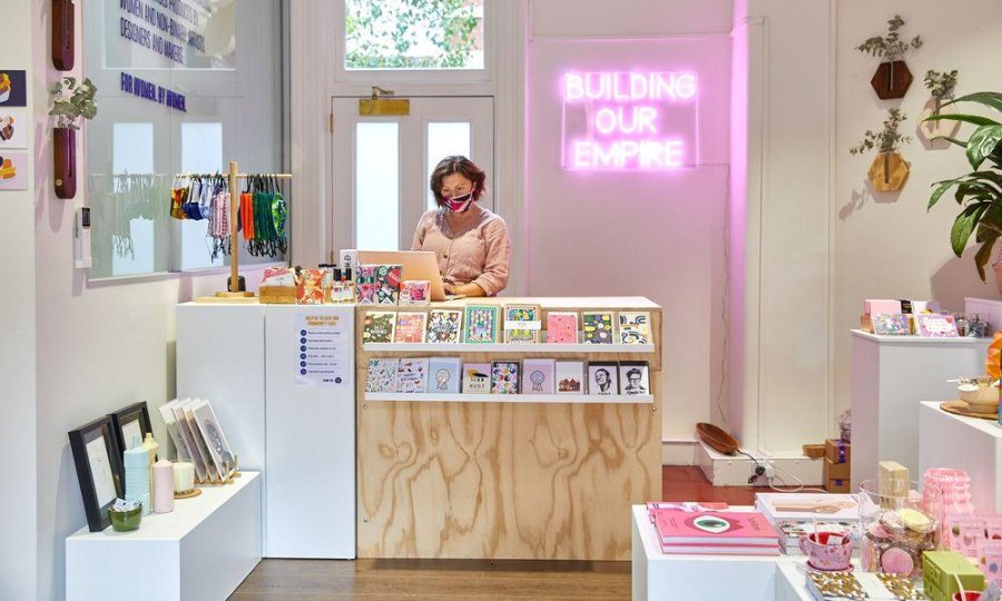 A woman working at a shop