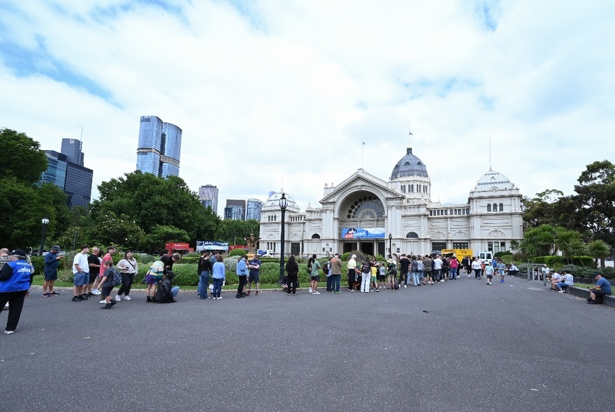 People queuing outside the Royal Exhibition Building.