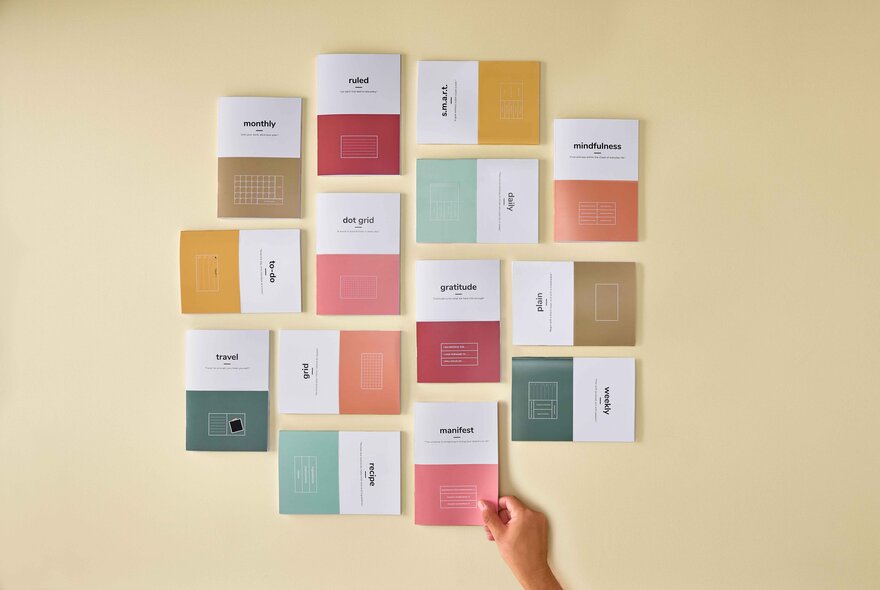 Journal pads with different coloured pages.