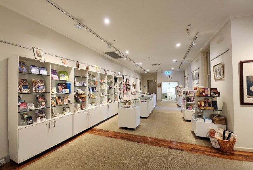 Objects on display in shelves and counters inside the Mary MacKillop Heritage Centre.