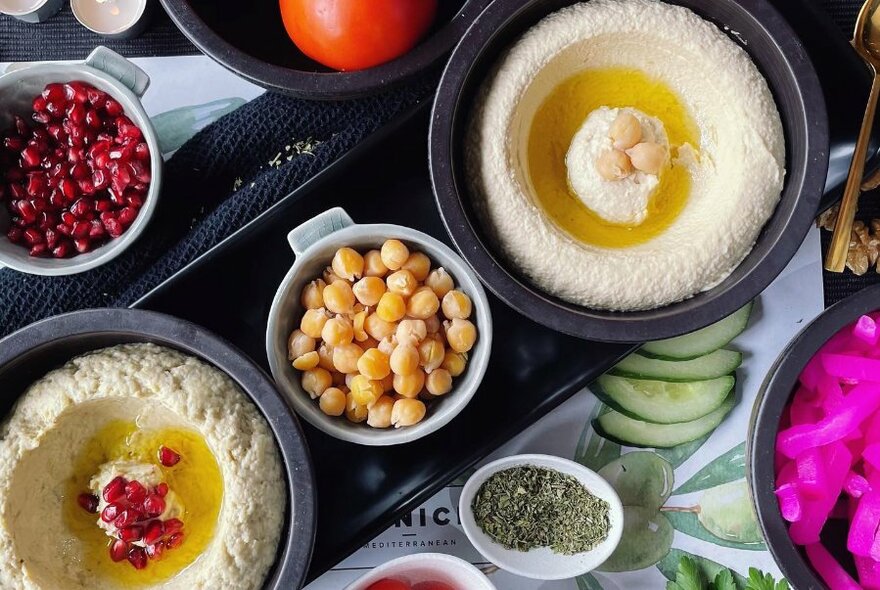 Bowls of dips and ingredients.