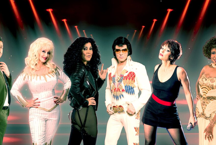 Four tribute performers dressed as Cher, Dolly Parton, Elvis, and Pat Benatar.