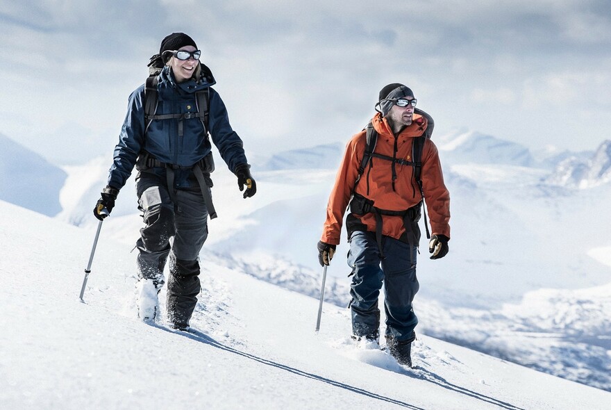 Two people skiing.