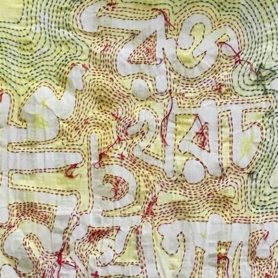 Artwork from artist, Mita Chowdhury showing elaborate hand-stitching on a Bangladeshi handloom Khadi and an old sari, using a found gum tree branch and cotton threads.