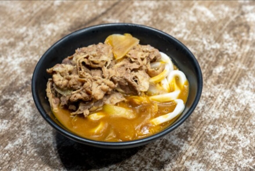 Dish of meat and noodles.