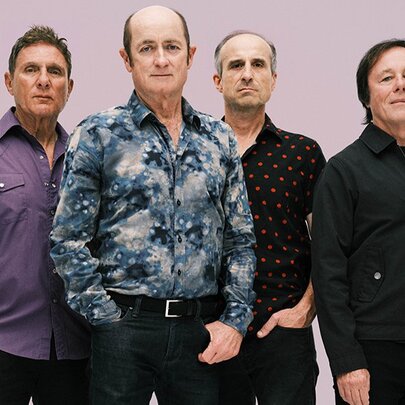 The four band members of the Hoodoo Gurus.