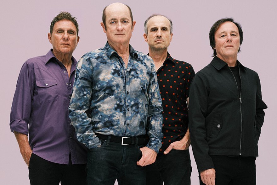 The four band members of the Hoodoo Gurus.