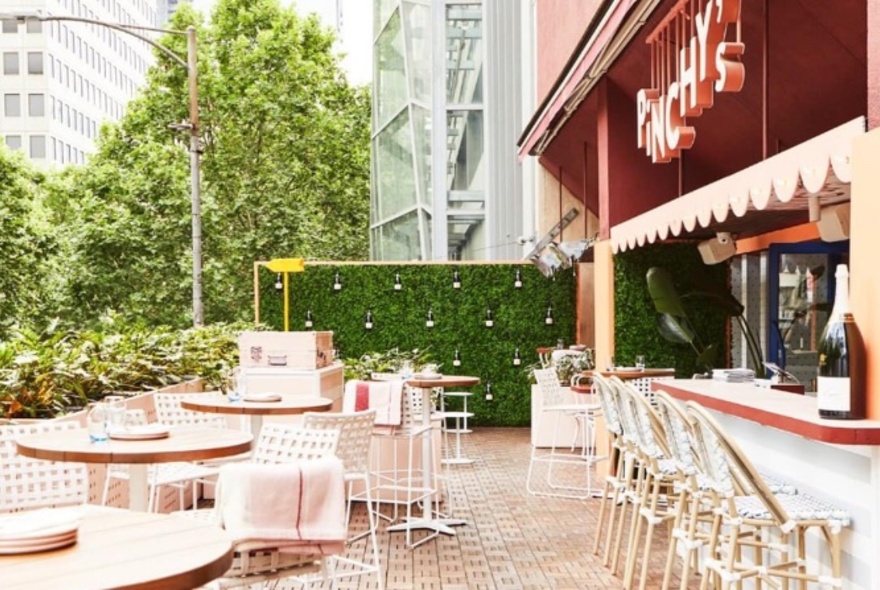 Outdoor terrace bar and cafe tables.