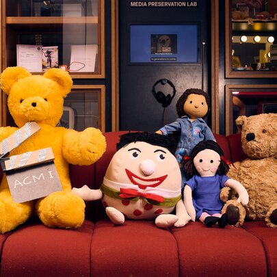 Play School exhibition with signature teddy and toys.