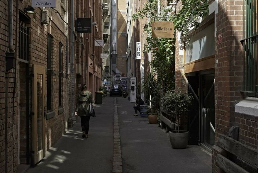 Laneway showing signage for Billie Jean Hair.