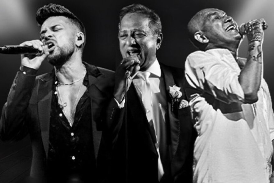 A black and white image of three vocalists performing with emotion.