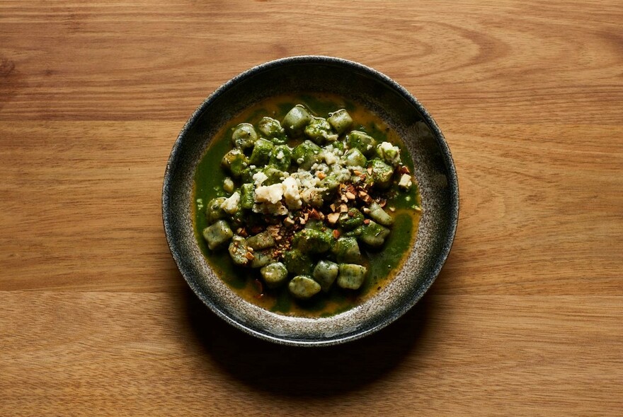 Dish of food on a wooden table.