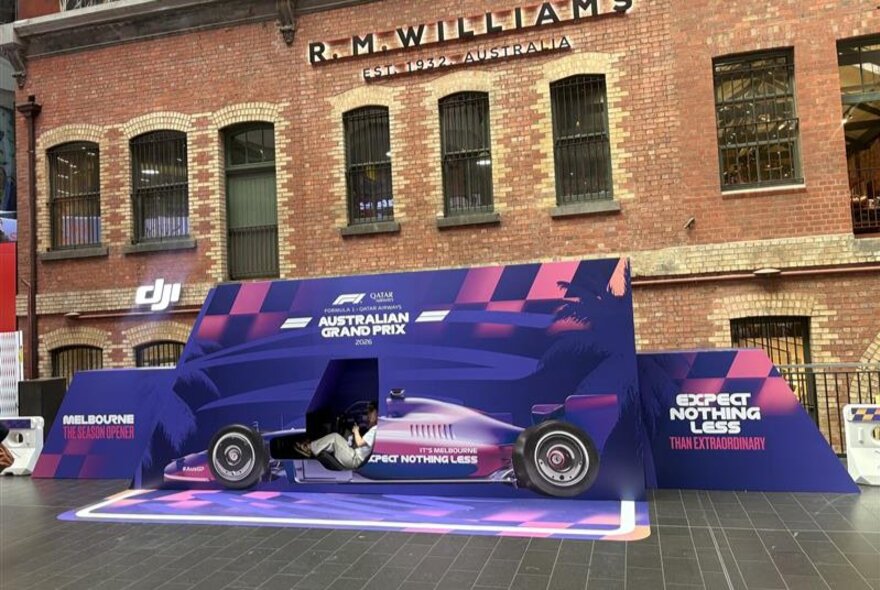 A pop-up installation within Melbourne Central featuring Grand Prix themed graphics. 