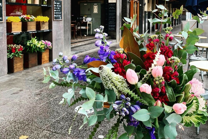 Bouquet of flowers outside a flower stand on Spring Street.