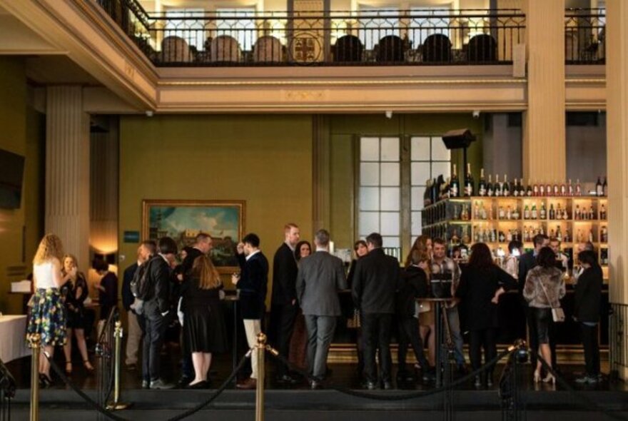 Corporate crowd in Bank on Collins heritage-listed building.