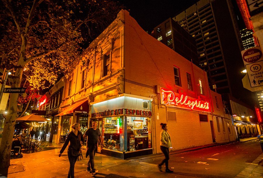 A night shot of Pellegrini's building on the corner. 