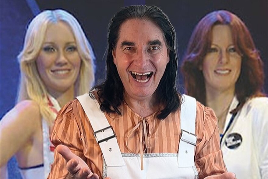 A man with long black hair wearing white overalls overlayed in the middle of the two ABBA singers. 