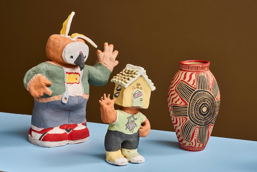 Three small and colourful contemporary ceramics and sculptures on display at the gallery space at Craft.