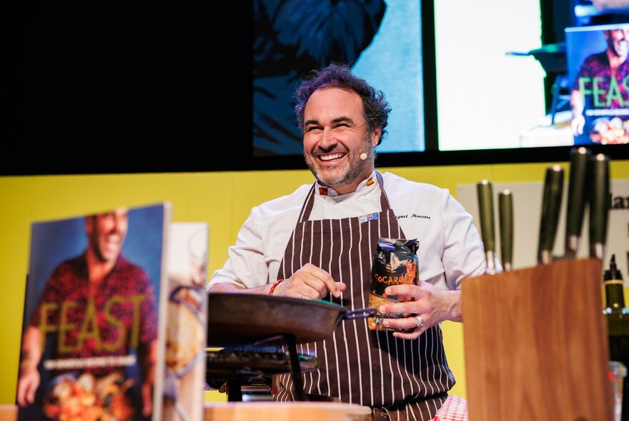 Chef Migues Maestre demonstrating during a cooking show. 