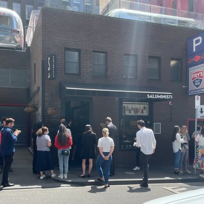 People lining up outside Saluministi in Flinders Lane.