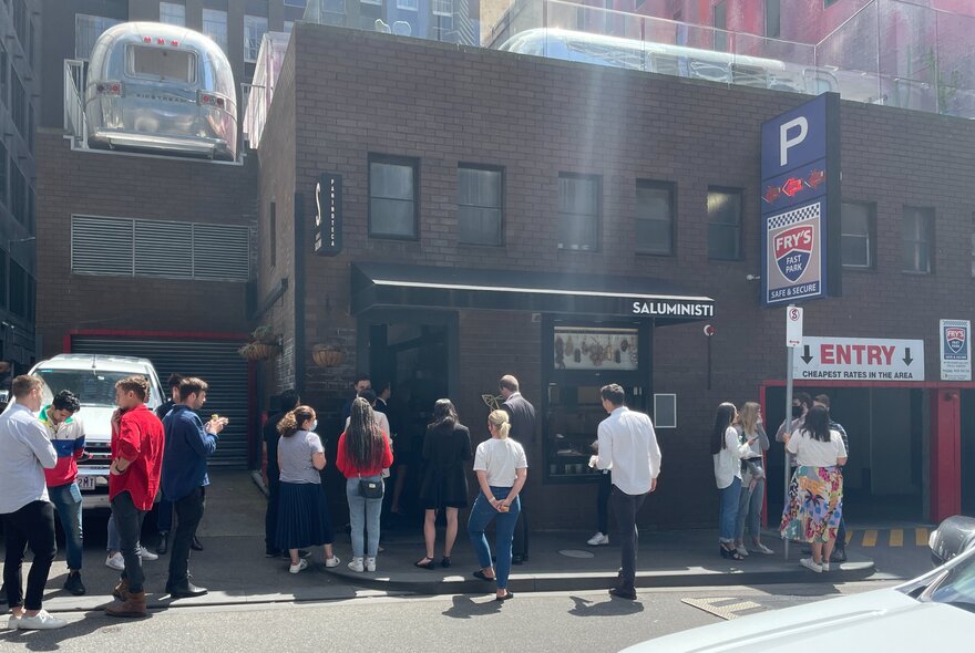People lining up outside Saluministi in Flinders Lane.