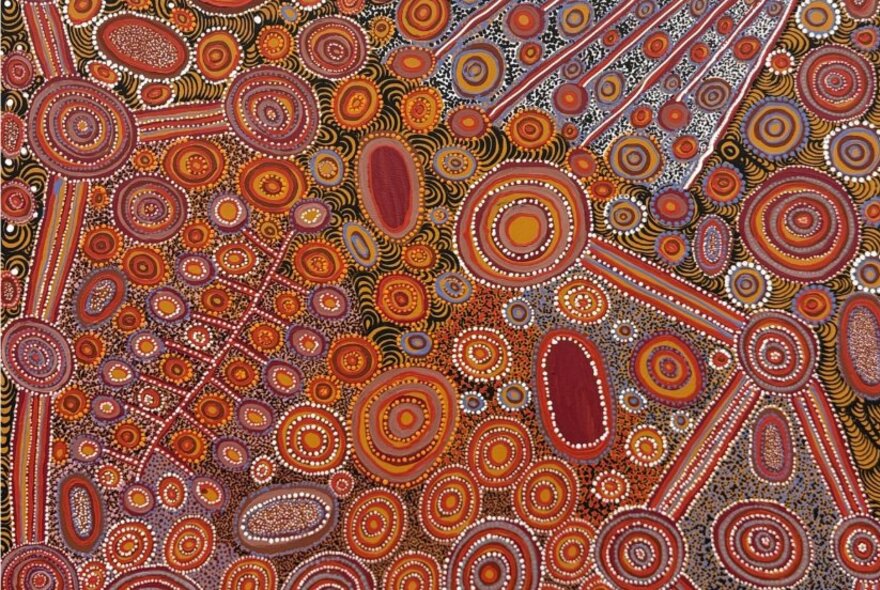 Orange and red toned First Nations traditional painting.