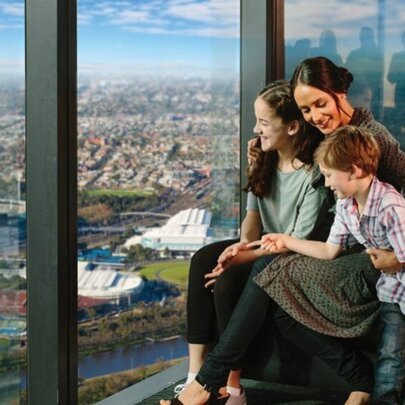 A family enjoying the 88th floor panoramic views of Melbourne from Melbourne Skydeck.
