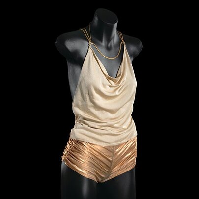 A black mannequin displaying the gold hot pants and halter top worn by Kylie Minogue in her famous music video, Spinning Around.