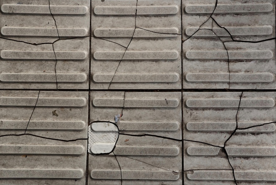 Cracked detail of a repaired pavement.