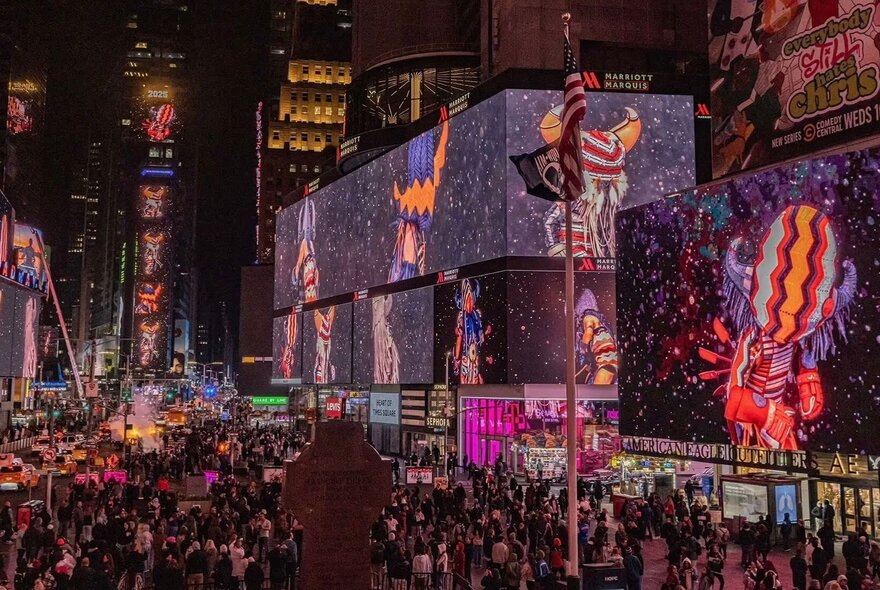 Times Square NYC activation with light panels and crowds.