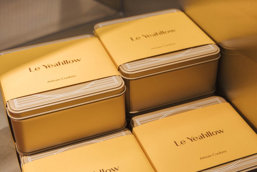 Cookie tins with yellow packaging 