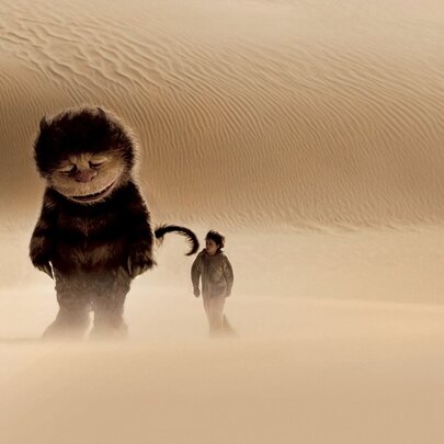 A scene with Max and the Wild Thing Carol walking along a sand dune, from the 2009 fantasy drama film Where the Wild Things Are.