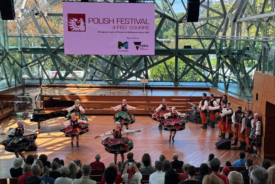 Dancers performing to a seated audience inside The Edge theatre at the Polish Festival  at Fed Square.