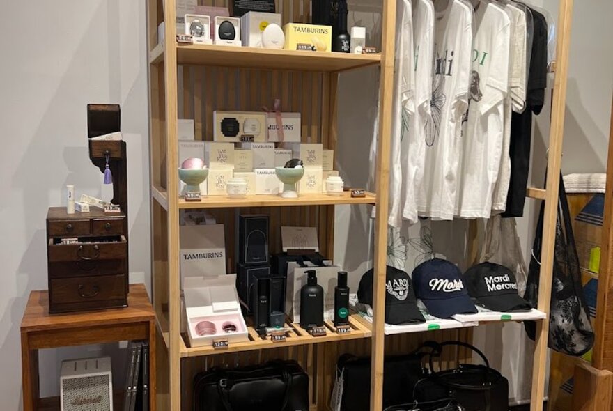 Display shelves stocked with caps, T-shirts, soaps and other Korean items.