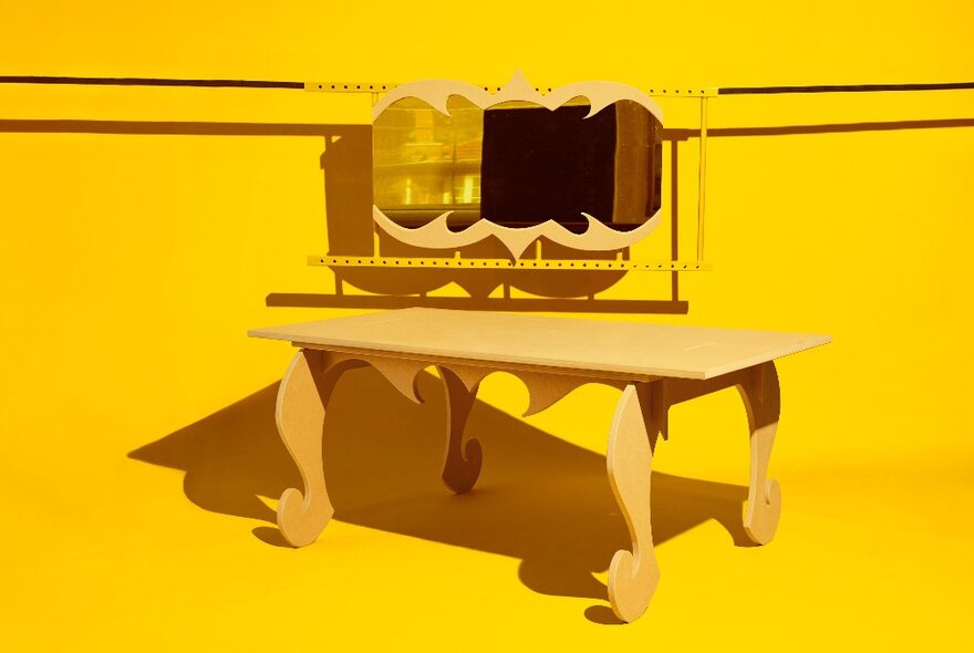 A highly stylised image of a yellow table in a yellow room.