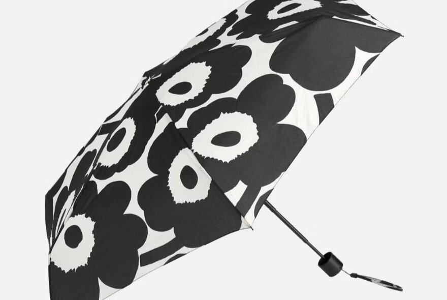 A black and white floral umbrella.