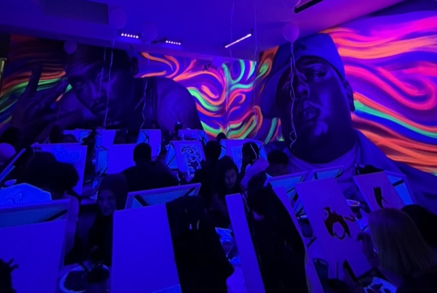 Glow in the dark artwork with swirling colours.