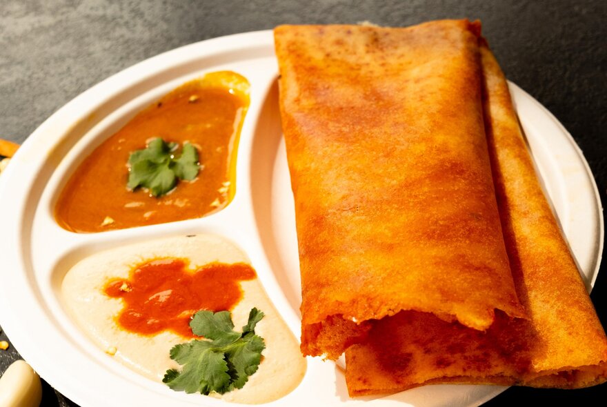 Authentic South Indian dhosa with two differenct sauces.