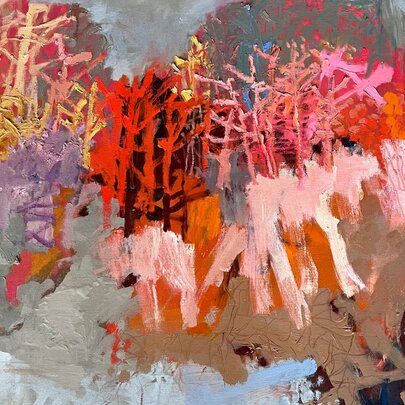 Abstract artwork of flowers in reds and pinks.
