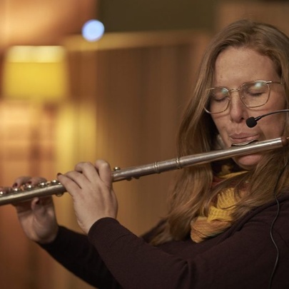 Student Composer in Residence, Leah Blankendaal playing the flute. 