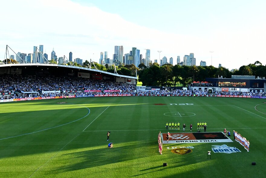 Icon Park ground with city buildings in the background.