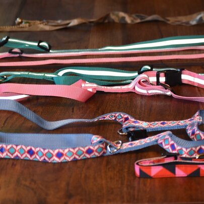 A table with a selectionn of ribbons and trims in different colours. 