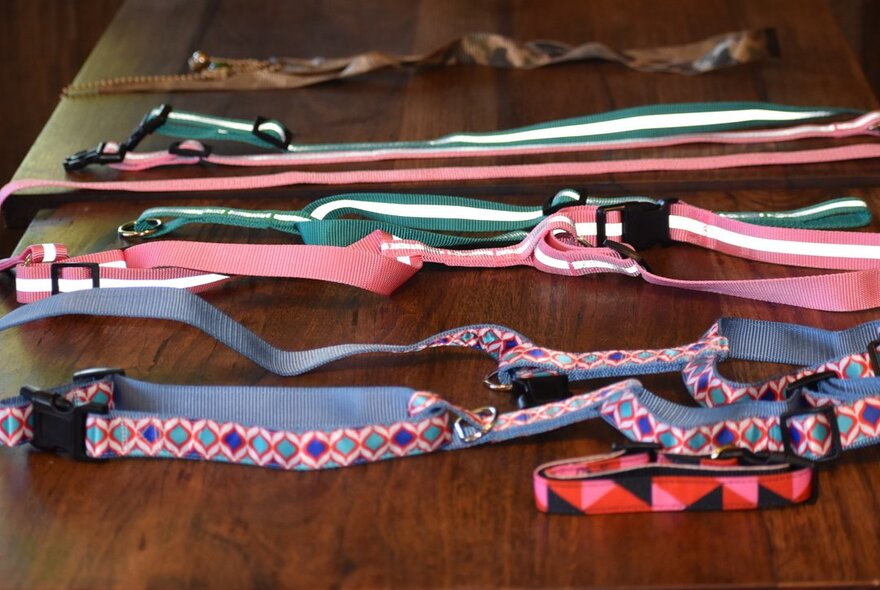 A table with a selectionn of ribbons and trims in different colours. 