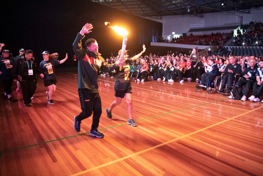 Athletes participating in the athlete walk at the opening ceremony for the Australian Special Olympics national games.