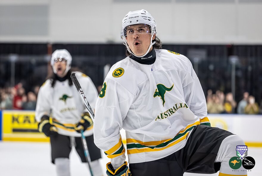 Two Australian ice hockey players on the ice.