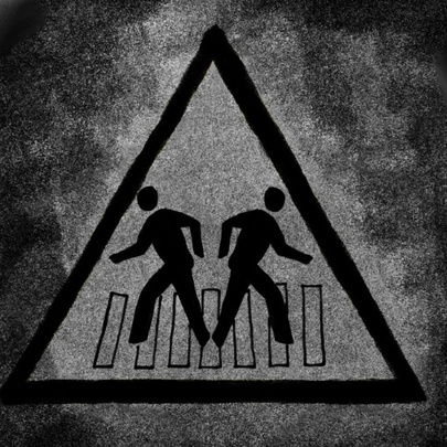 Road sign of pedestrians walking on a zebra crossing.