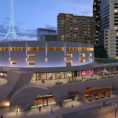 Looking at the Australian Museum of Performing Arts with the Arts Centre spire and city buildings visible in the background. 