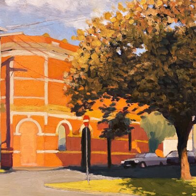 Painting of a large brick building on a corner with a tree in the foreground and some parked cars. 