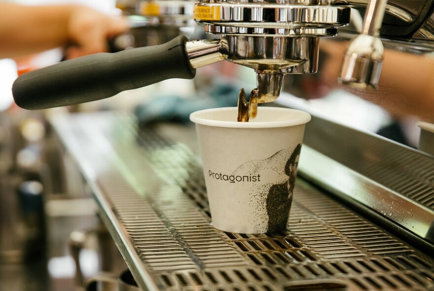 Coffee machine and coffee cup at Protagonist café.